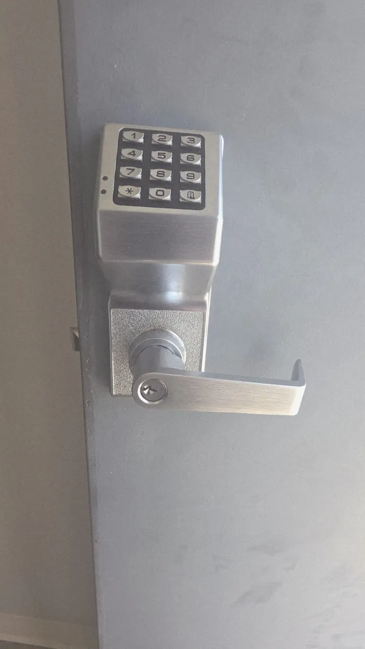 Pros On Call technician commissioning a cloud-managed access control panel at a Texas commercial facility