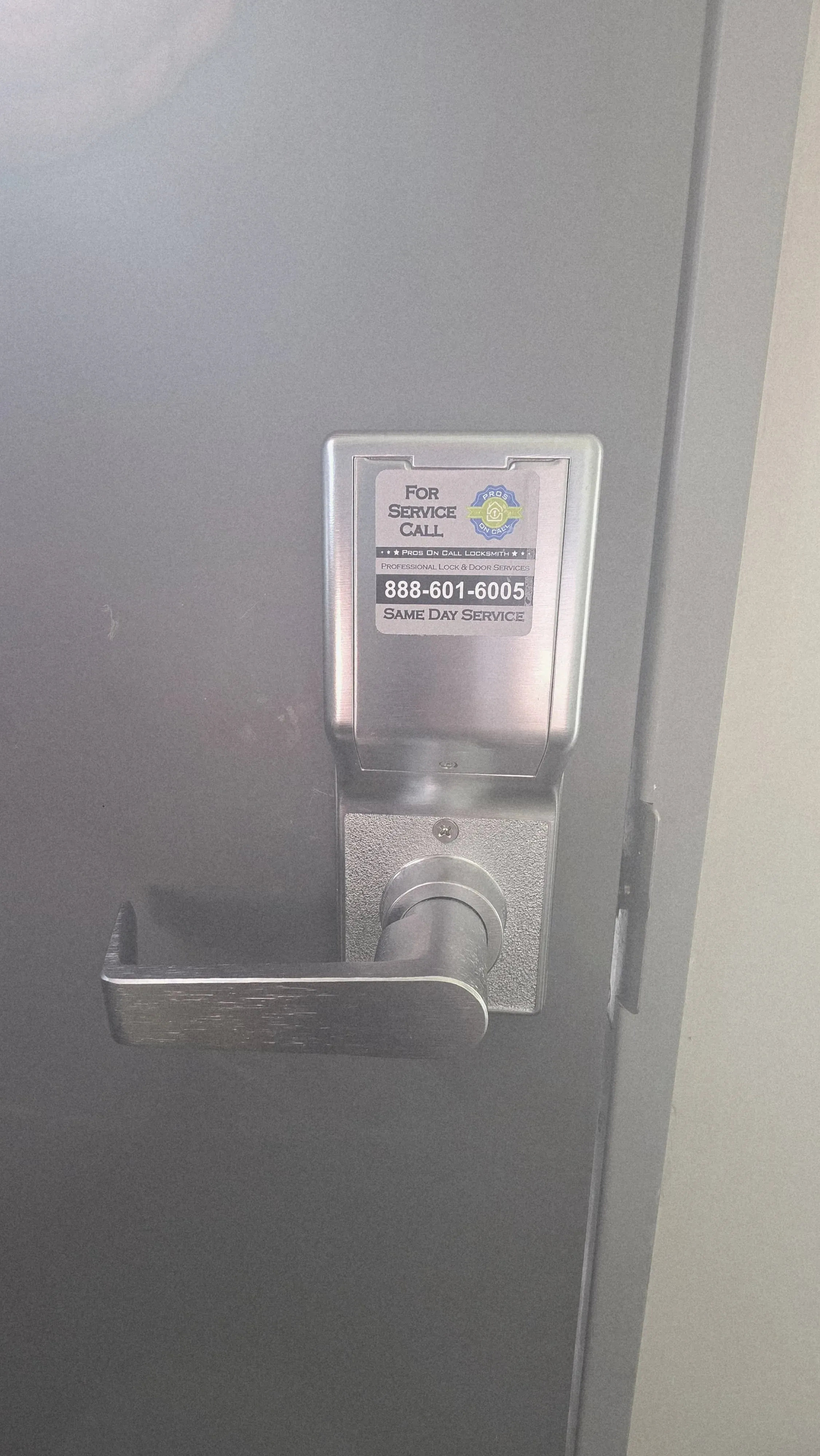 Access control service sticker on completed commercial installation in Texas