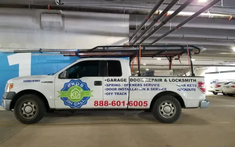 Pros On Call Ford F-150 truck with service list parked outside a Texas garage, representing a professional repair company