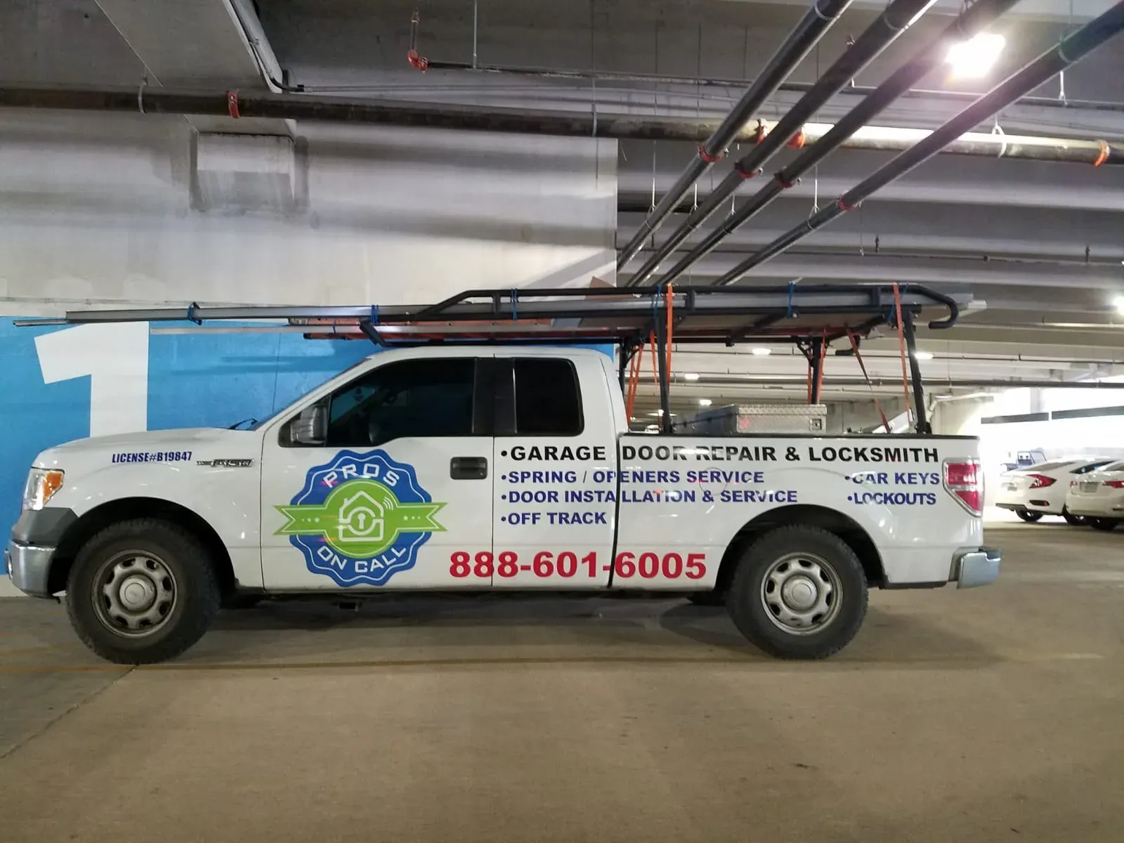 Pros On Call service truck parked in a parking garage in Texas