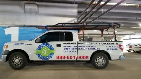 Pros On Call Ford F-150 truck with service list parked outside a Texas garage, representing a professional repair company