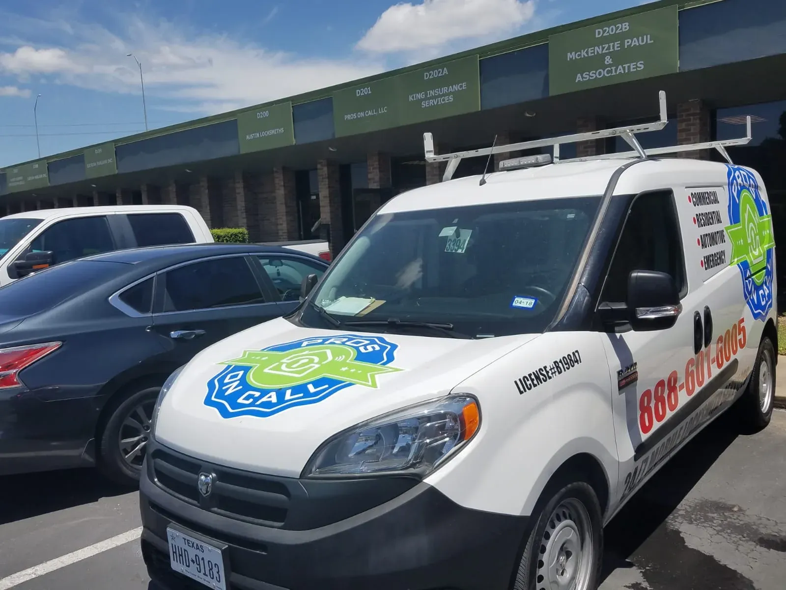 Pros On Call Ram ProMaster service van parked at the Austin office, branded locksmith vehicle ready for dispatch