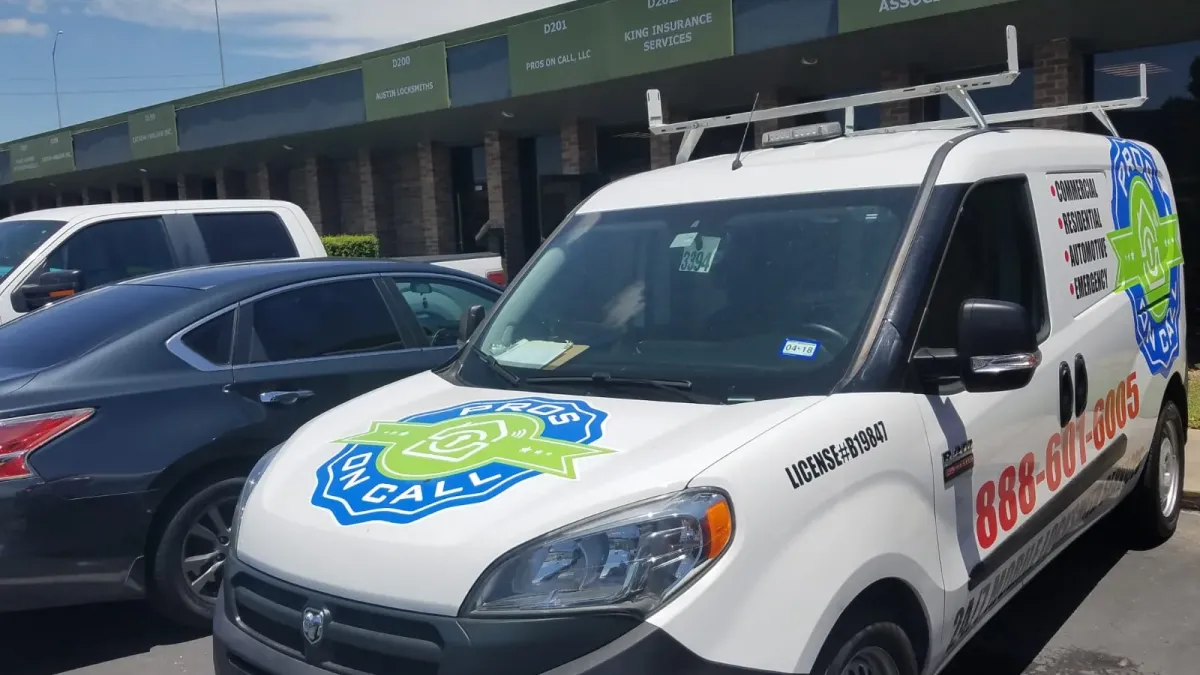Pros On Call Ram ProMaster service van parked outside an Austin TX office building ready to respond