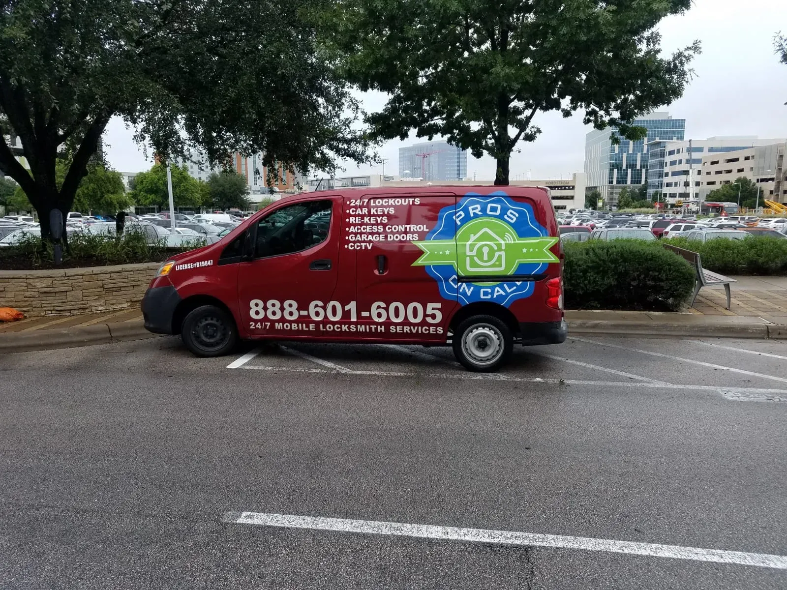 Pros On Call service vehicle parked near a commercial complex in Austin, Texas
