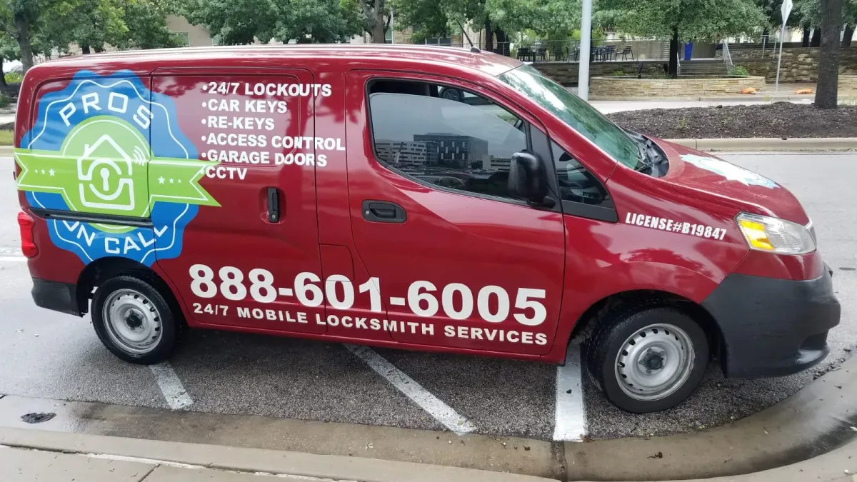 Side panel of a Pros On Call red Nissan NV200 service van listing locksmith services in Austin TX