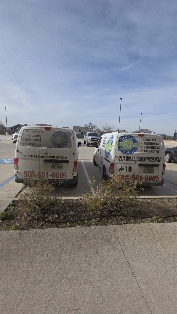 Two Pros On Call service vans parked together before dispatch across Texas metro areas