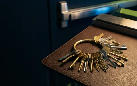 Pros On Call commercial locksmith demonstrating master key hardware alongside a panic bar at an Austin TX business