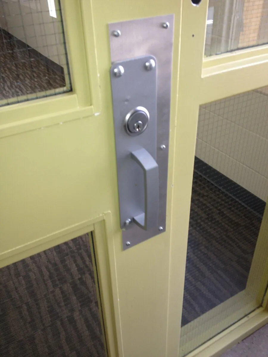 Commercial panic hardware installed on a business exit door, Houston, Texas