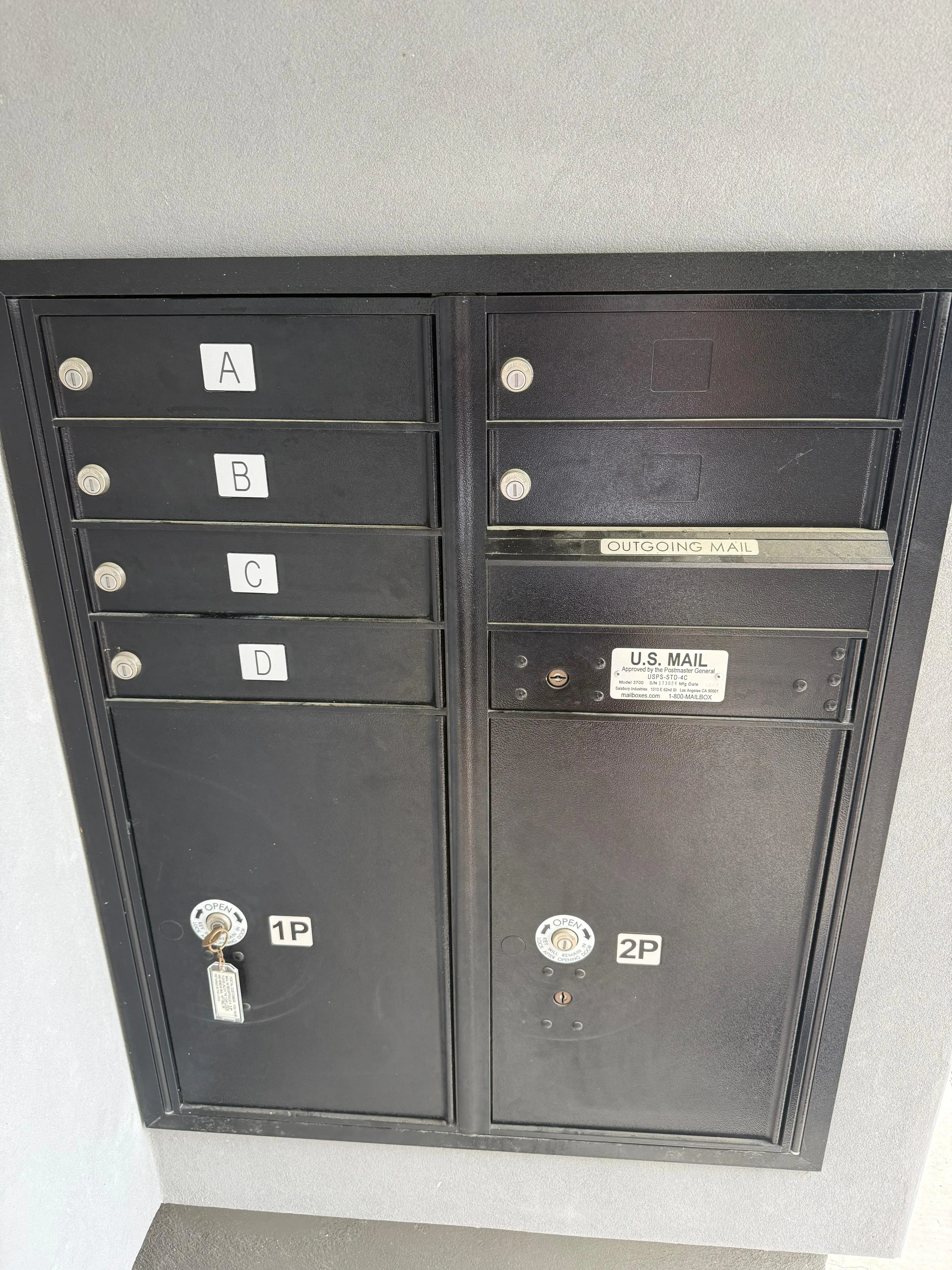 Apartment mailbox cluster in a Texas complex, the shared delivery point where package theft is most common