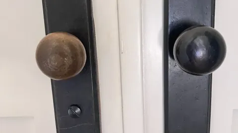 Before-and-after view of a residential door knob and deadbolt installation by Pros On Call in Austin TX, showing how deadbolts improve home security