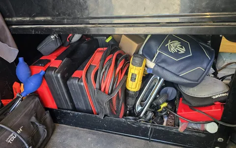 Pros On Call locksmith tools laid out on a workbench in Austin TX, showing the professional equipment that justifies hiring a licensed locksmith