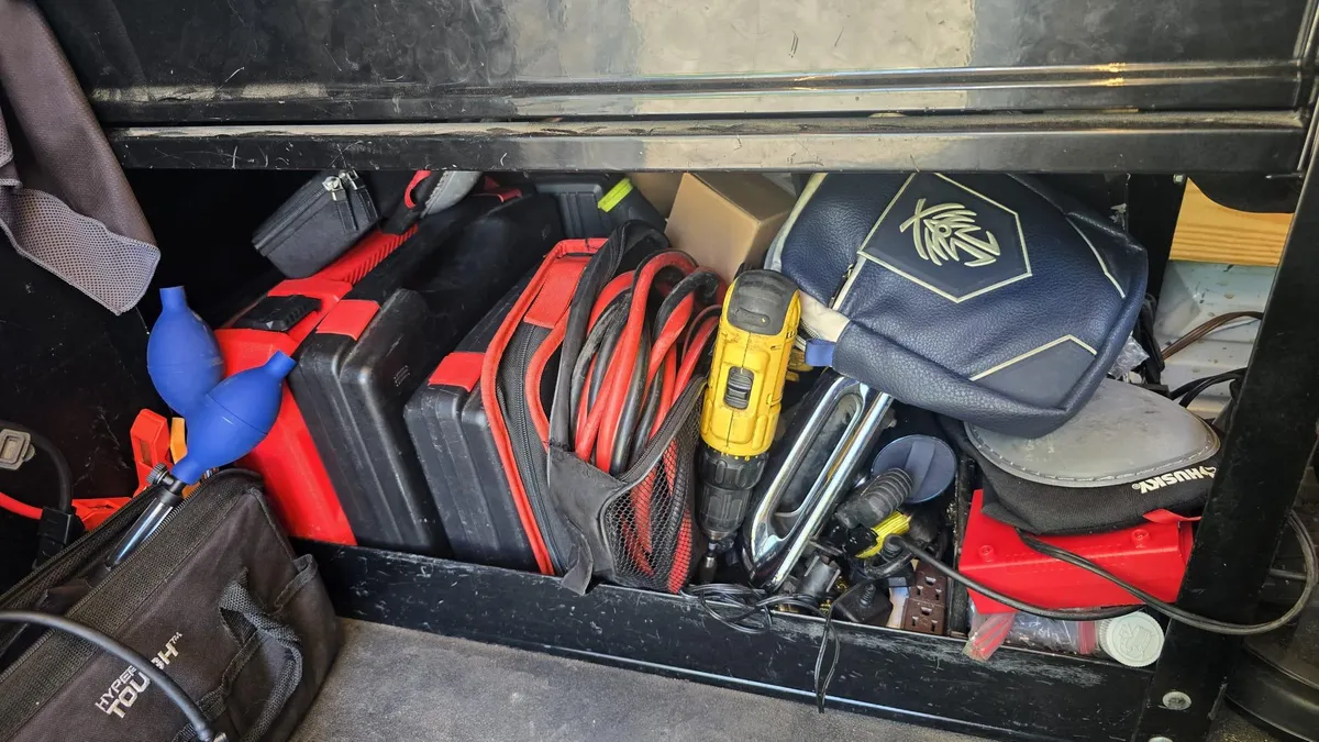Pros On Call locksmith tools laid out on a workbench in Austin TX, showing the professional equipment that justifies hiring a licensed locksmith