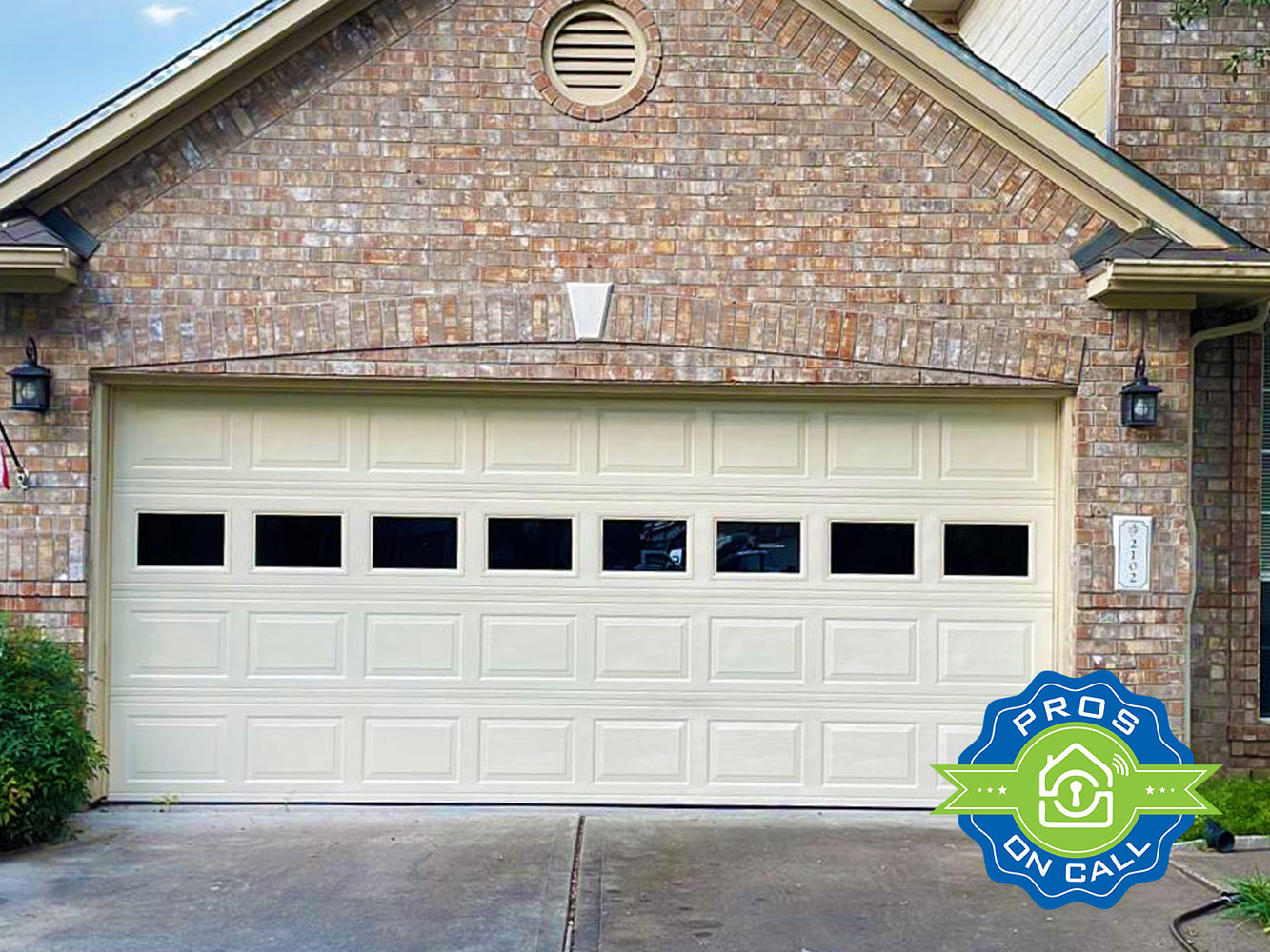 Pros On Call technician measuring a garage door opening for a new door installation
