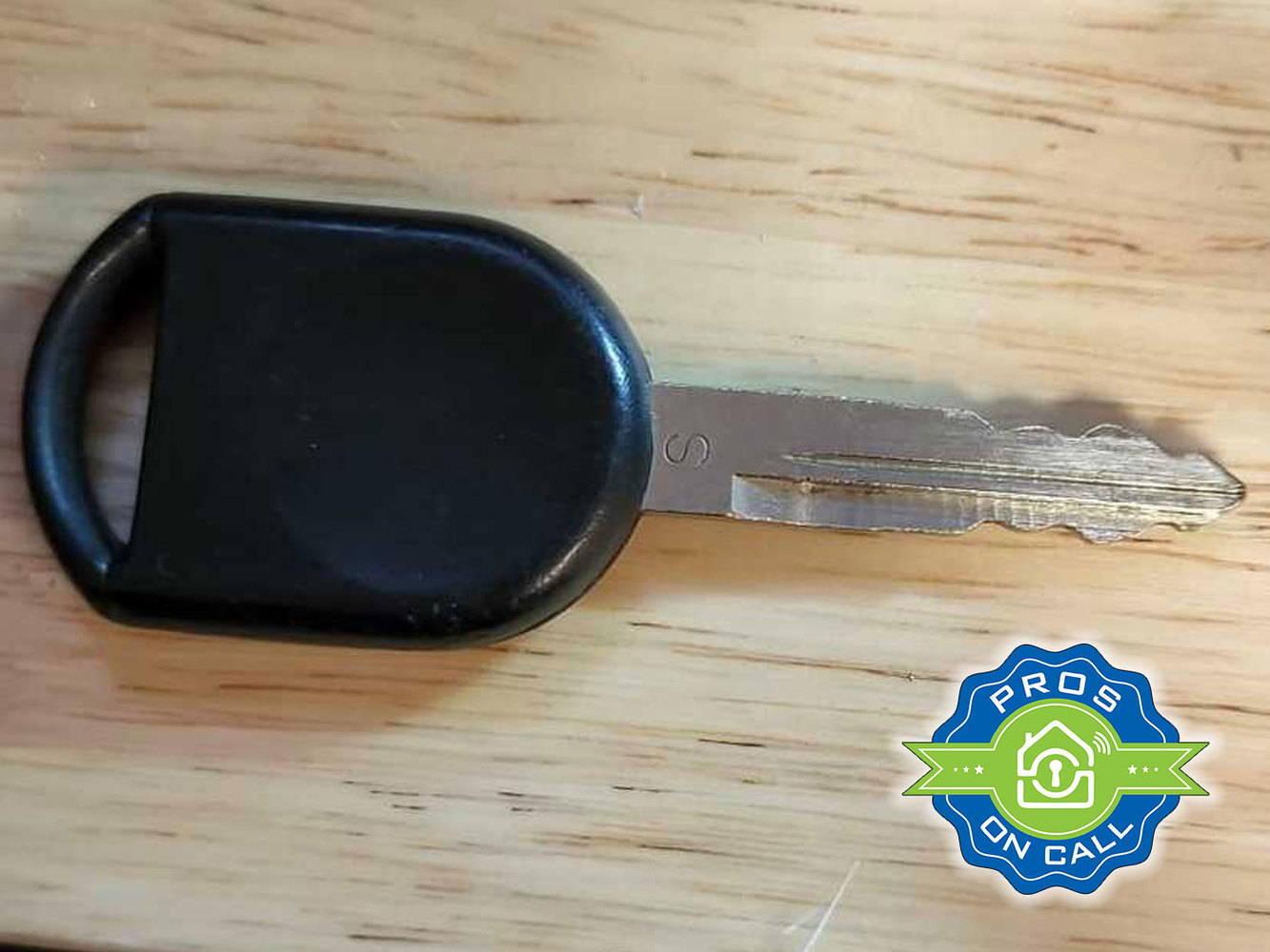 Pros On Call technician at work on a commercial door lock ,  business locksmith service in Texas