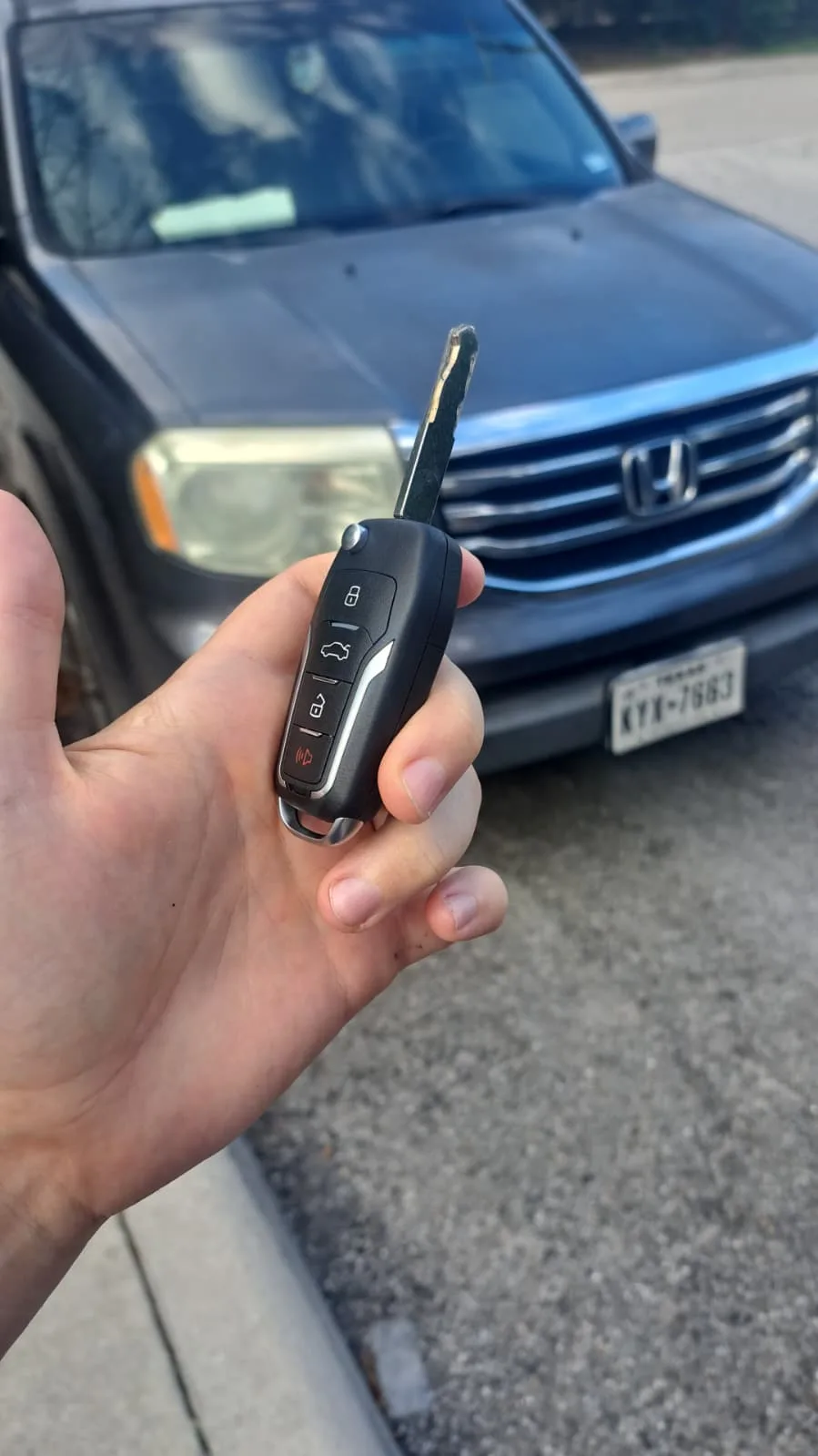 Honda key fob with blade programmed on site by Pros On Call automotive locksmith