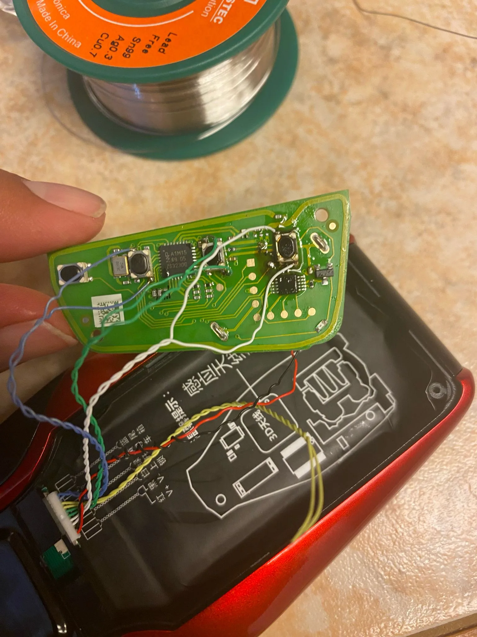 Transponder key circuit board showing automotive locksmith programming depth