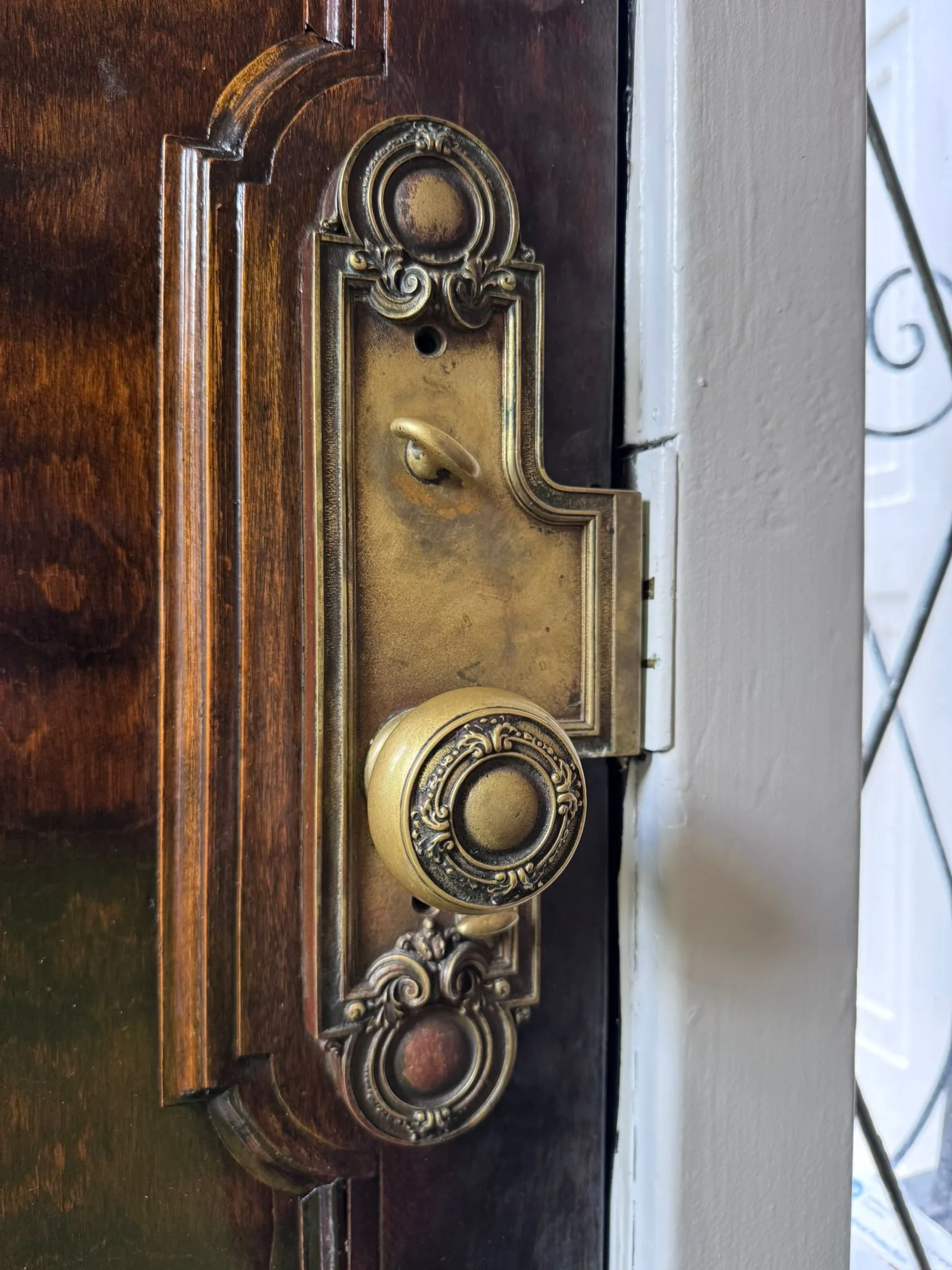 Victorian mortise knob and escutcheon installed on commercial door, premium commercial locksmith work by Pros On Call