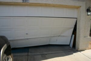 Damage Garage Door. For any residential and commercial garage door repair in TX Pros on call is your solution