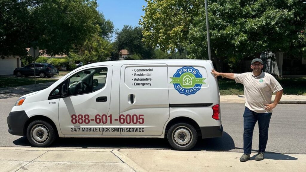 Locksmith Technician in Lakeway Texas beside the white vehicle for emergency locksmith