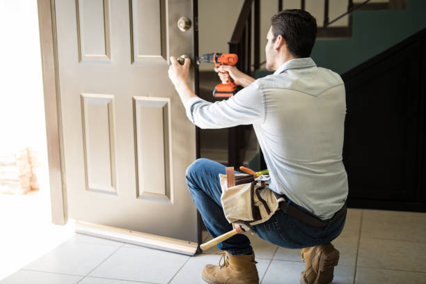 Rear view of a good looking man working as handyman and who is in door lock repair and Emergency Locksmith in Texas