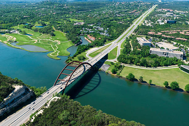 Aerial view from helicopter of 360 bridge on Colorado River near Austin Texas. 